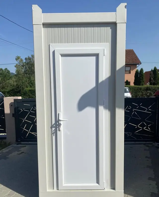 White flushing restroom cabin